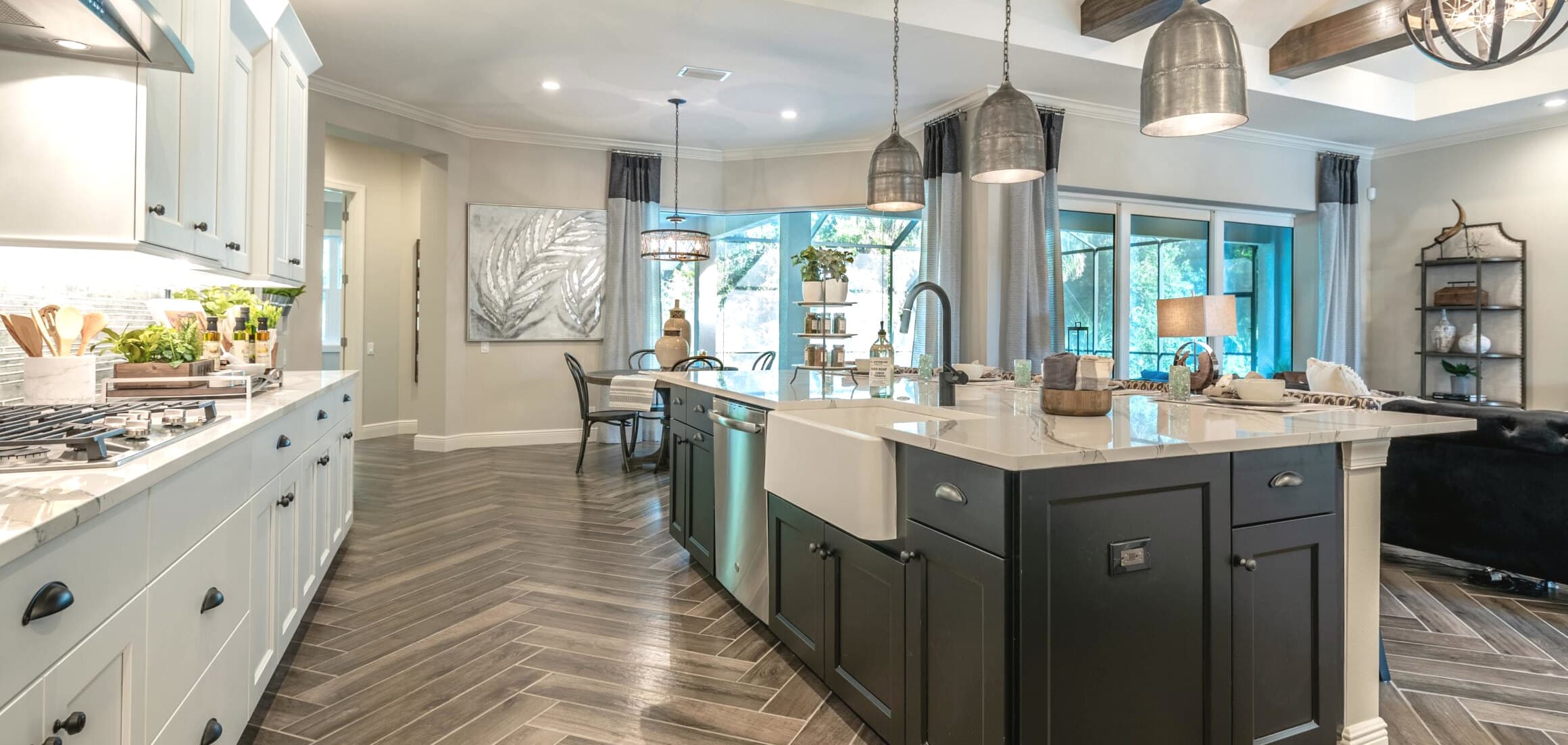 Kitchen and open living space in a Sam Rodgers home