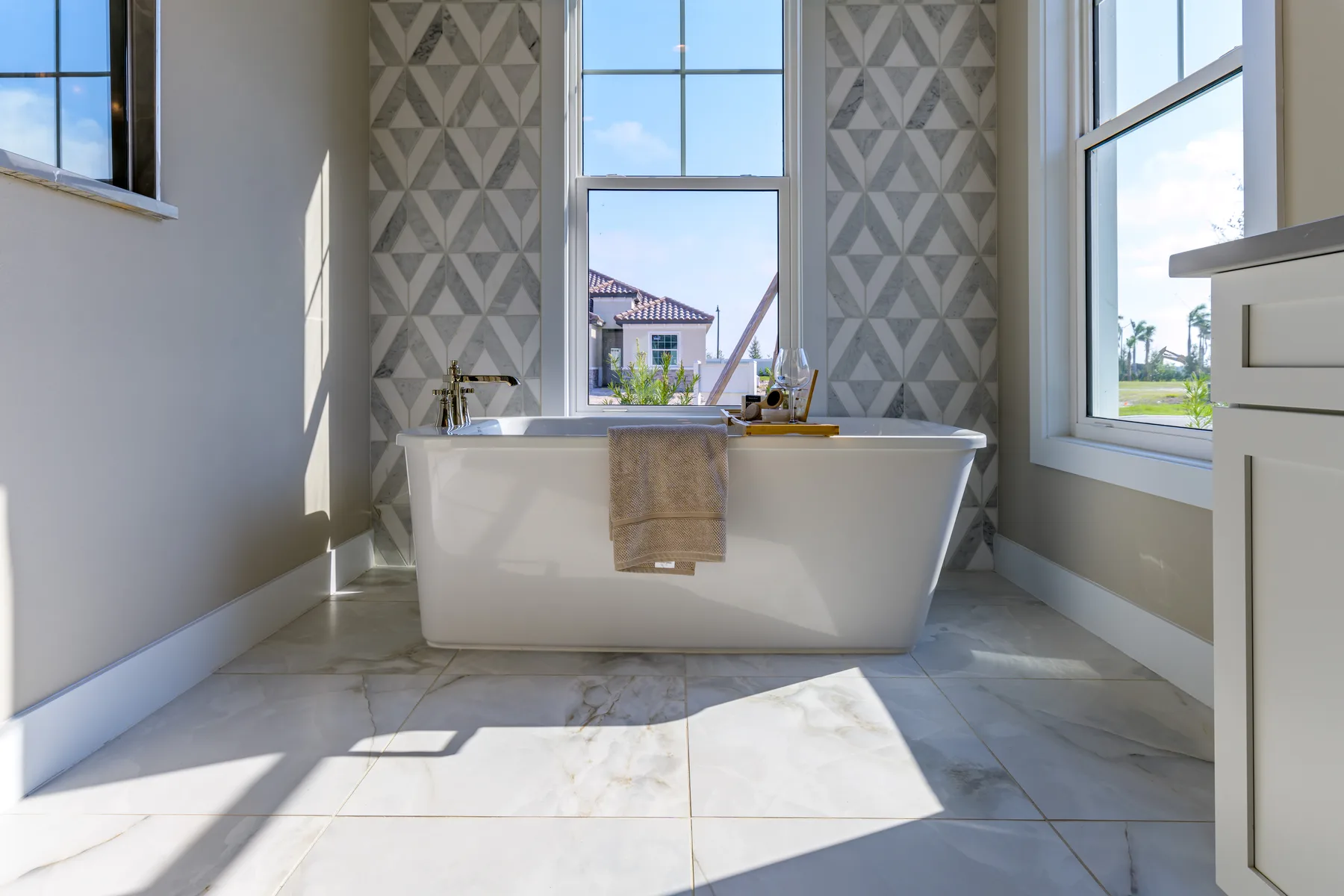 The Destin model home by Sam Rodgers Homes — freestanding soaking tub