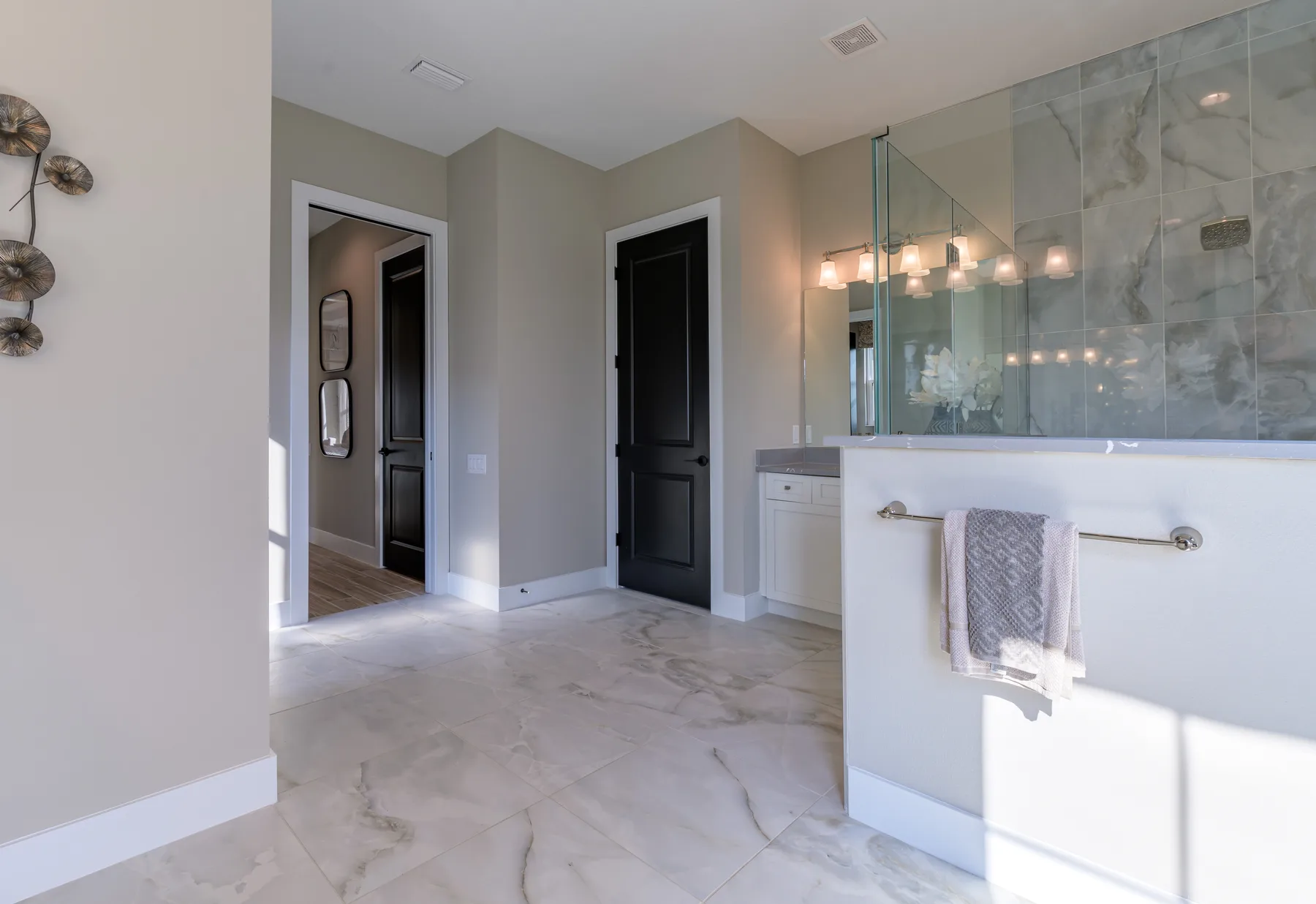 The Destin model home by Sam Rodgers Homes — hall bath