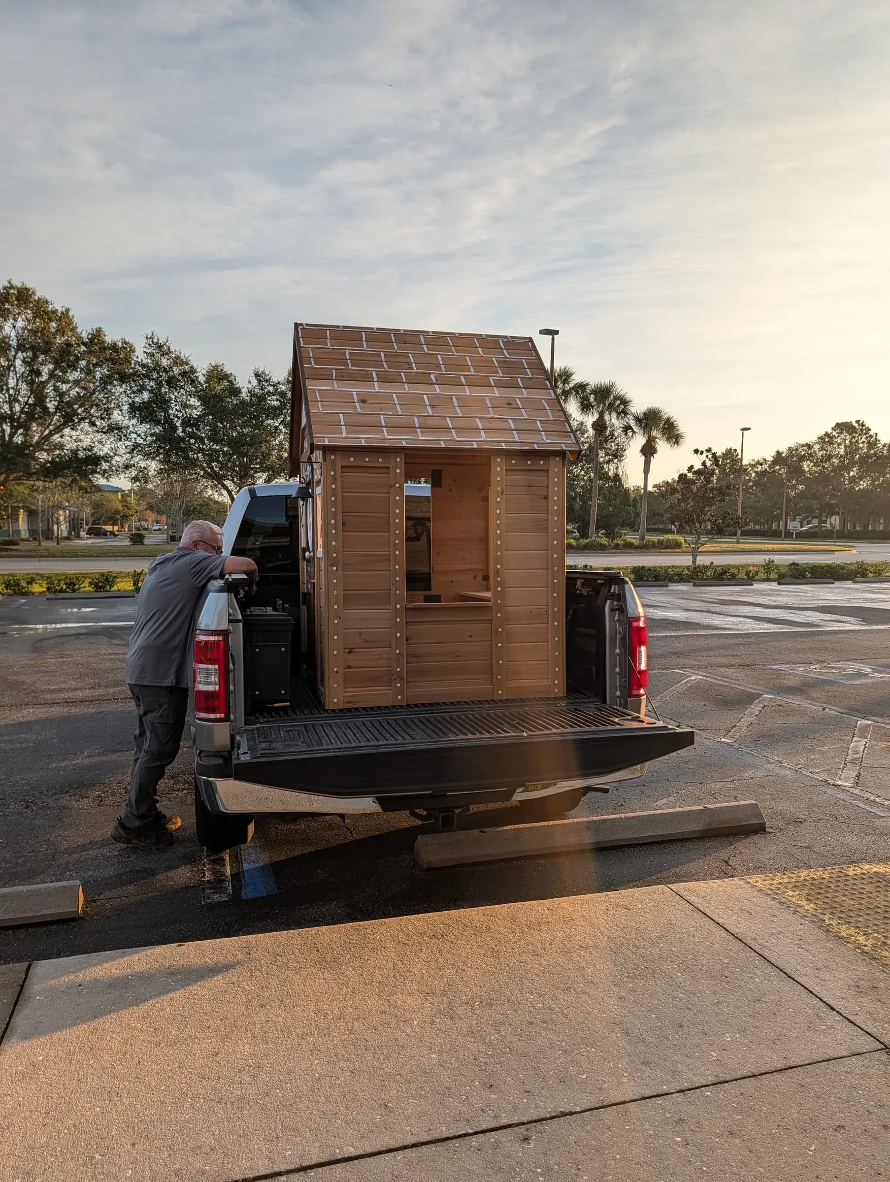 Loading the cottage onto the truck before sunrise on delivery day.